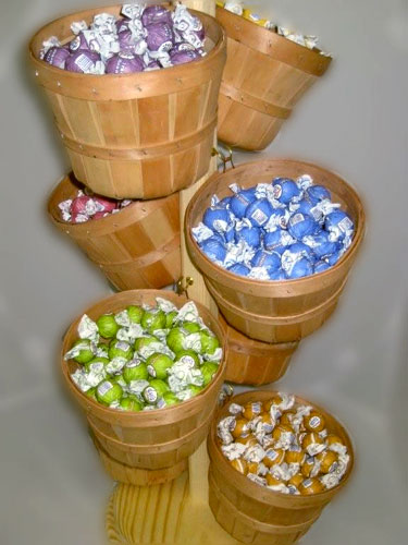 1/4 Peck Baskets Spinning Counter Rack w/Chocolate Truffles by CANDY CONCEPTS INC.