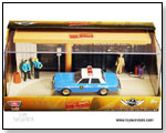 Motormax Reel Rides - The Usual Suspects at RMX Airlines Diorama w/ 1983 Dodge Diplomat Salon 1:43 Scale Die-Cast Model Police Car</title><style>.adr8 by TOY WONDERS INC.